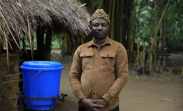 Mwami Alphonse Bin Kitobi, chief of the Bapakombe-Bakondo village, poses for a portrait in the Beni Territory of North Kivu, eastern Congo, Saturday, Oct. 24, 2026. (AP Photo/Sebastien Kitsa Musayi)