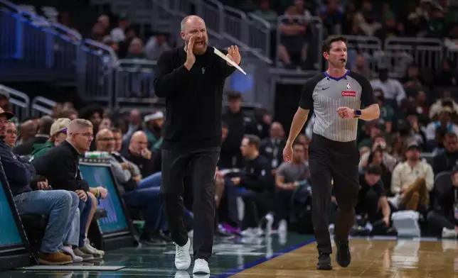 Milwaukee Bucks' head coach Taylor Jenkins gestures during a preseason NBA basketball game against the Minnesota Timberwolves Monday, Oct. 5, 2026, in Milwaukee. (AP Photo/Kylie Bridenhagen)
