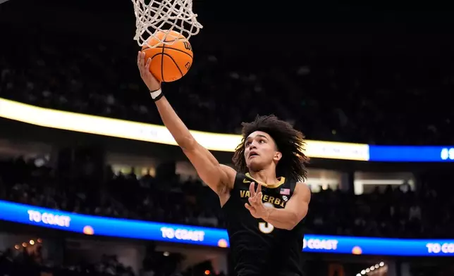 FILE - Vanderbilt guard Tyler Tanner (3) plays during the first half of an NCAA college basketball game against Arkansas in the final of the Southeastern Conference tournament, March 15, 2026, in Nashville, Tenn. (AP Photo/George Walker IV, File)