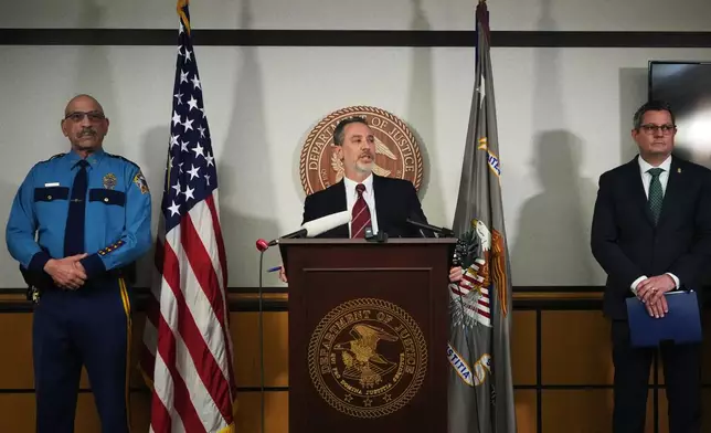 U.S. Attorney for the District of Alaska Michael J. Heyman holds a news conference on a criminal investigation related to an alleged scheme to confuse voters by putting a Senate candidate on the ballot with the same name as the Republican incumbent, at the James M. Fitzgerald U.S. Courthouse and Federal Building, Friday, Oct. 30, 2026, in Anchorage, Alaska. (AP Photo/Lindsey Wasson)