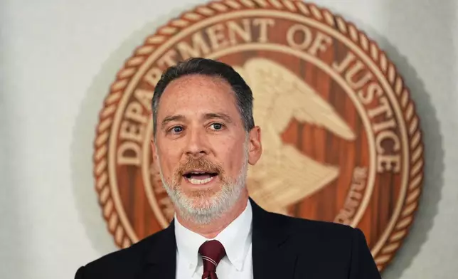 U.S. Attorney for the District of Alaska Michael J. Heyman holds a news conference on a criminal investigation related to an alleged scheme to confuse voters by putting a Senate candidate on the ballot with the same name as the Republican incumbent, at the James M. Fitzgerald U.S. Courthouse and Federal Building, Friday, Oct. 30, 2026, in Anchorage, Alaska. (AP Photo/Lindsey Wasson)