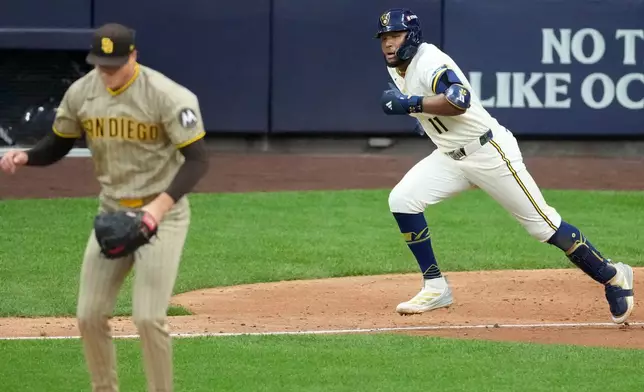 Milwaukee Brewers' Jackson Chourio hits a walkoff hit off San Diego Padres' Mason Miller during the ninth inning of Game 2 of a National League Divisional baseball playoff series Sunday, Oct. 4, 2026, in Milwaukee. (AP Photo/Chris Carlson)