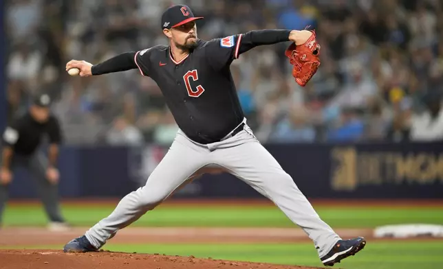 Cleveland Guardians pitcher Shawn Armstrong throws against the Tampa Bay Rays during the first inning in Game 6 of an American League Championship Series baseball game in St. Petersburg, Fla. Monday, Oct. 19, 2026. (AP Photo/Phelan M. Ebenhack)