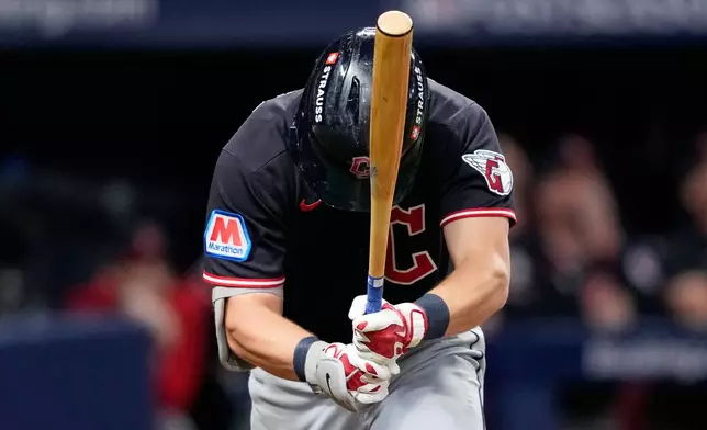 Cleveland Guardians' Travis Bazzana reacts after flying out Tampa Bay Rays during the second inning in Game 6 of an American League Championship Series baseball game in St. Petersburg, Fla. Monday, Oct. 19, 2026. (AP Photo/David J. Phillip)