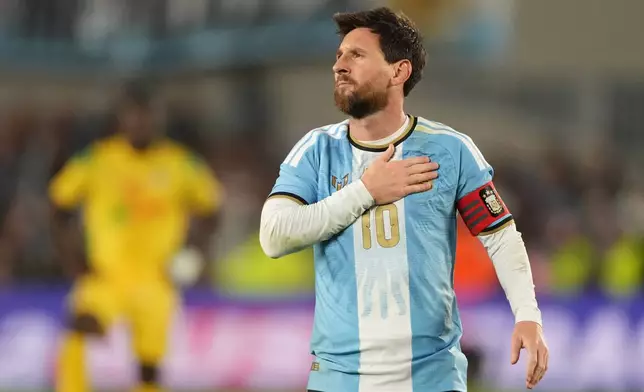 Argentina's Lionel Messi celebrates after scoring his third goal from the penalty spot during his final match for the national team, a soccer friendly against Benin, in Buenos Aires, Argentina, Tuesday, Oct.6, 2026. (AP/Photo/Gustavo Garello)