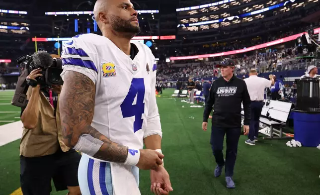 Dallas Cowboys quarterback Dak Prescott (4) leaves the field after a loss to the Tampa Bay Buccaneers in an NFL football game in Arlington, Texas on Thursday, Oct. 8, 2026. (AP Photo/Sam Hodde)