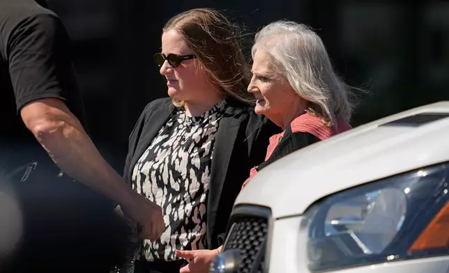 May Martinez, left, mother of murder victim Colleen Slemmer, walks out of Riverbend Maximum Security Institution during a stay of the planned execution of Christa Pike, Wednesday, Sept. 30, 2026, in Nashville, Tenn. (AP Photo/George Walker IV)