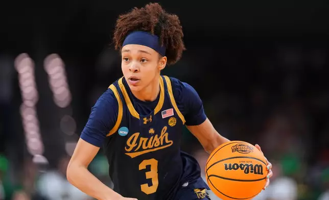 FILE - Notre Dame guard Hannah Hidalgo (3) drives to the basket during Sweet 16 game between Notre Dame and Vanderbilt at the NCAA college basketball tournament, March 27, 2026, in Fort Worth, Texas. (AP Photo/Julio Cortez, File)