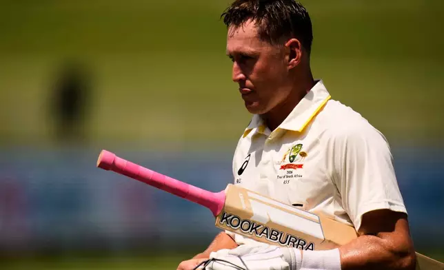 Australia's Marnus Labuschagne leaves the field after being dismissed on day one of the first cricket test match between South Africa and Australia, in Durban, South Africa, Friday, Oct. 9, 2026. (AP Photo/Themba Hadebe)