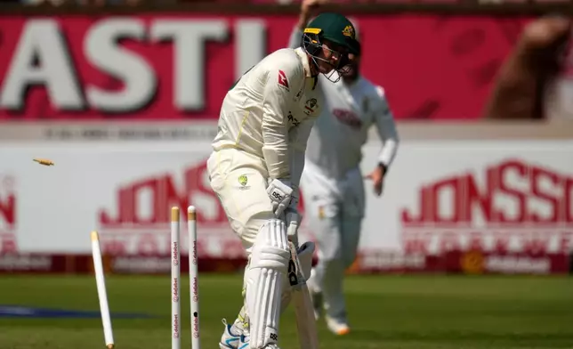 Australia's Nic Maddinson is bowled on day one of the first cricket test match between South Africa and Australia, in Durban, South Africa, Friday, Oct. 9, 2026. (AP Photo/Themba Hadebe)