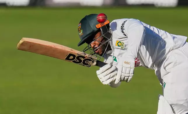 South Africa's captain Temba Bavuma plays a shot on day two of the second cricket test match between South Africa and Australia, in Gqeberha, South Africa, Monday, Oct. 19, 2026. (AP Photo/Themba Hadebe)
