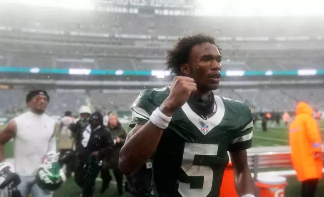 New York Jets wide receiver Garrett Wilson (5) walks off the field after an NFL football game against the Cleveland Browns, Sunday, Oct. 11, 2026, in East Rutherford, N.J. (AP Photo/Seth Wenig)