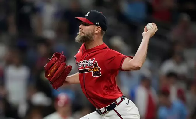 Atlanta Braves pitcher Chris Sale throws against the Philadelphia Phillies in the ninth inning during Game 3 of baseball's NL Wild Card Series, Thursday, Oct. 1, 2026, in Atlanta. (AP Photo/Brynn Anderson)
