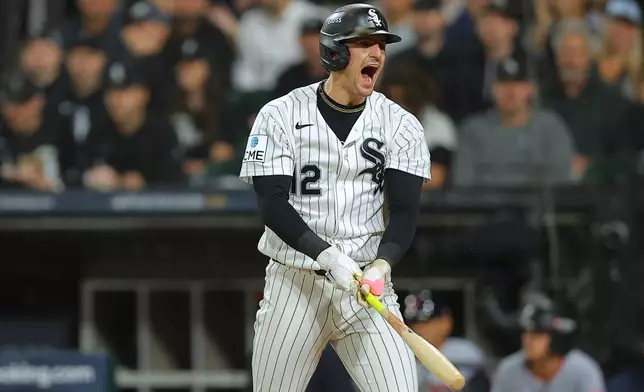Chicago White Sox' Colson Montgomery (12) reacts after striking out during the fourth inning in Game 4 of baseball's American League Division Series against the Cleveland Guardians, Thursday, Oct. 8, 2026, in Chicago. (AP Photo/Melissa Tamez)