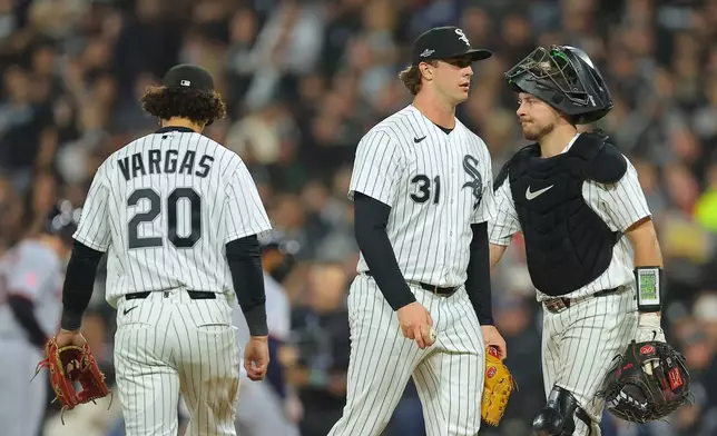 Chicago White Sox relief pitcher Grant Taylor (31) leaves the game during a pitching change in the sixth inning in Game 4 of baseball's American League Division Series against the Cleveland Guardians, Thursday, Oct. 8, 2026, in Chicago. (AP Photo/Melissa Tamez)