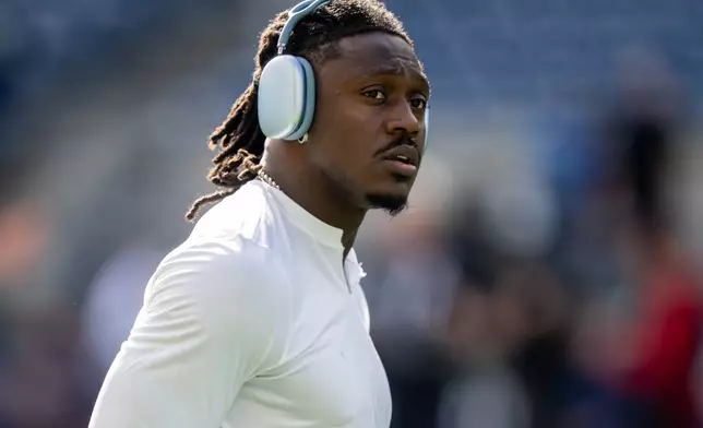 FILE - New England Patriots wide receiver A.J. Brown looks on during warmups before an NFL football game against the Seattle Seahawks, Wednesday, Sept. 9, 2026, in Seattle. (AP Photo/Stephen Brashear, File)