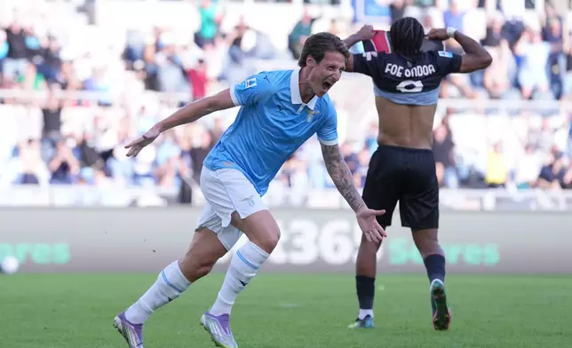 Lazio's Andrea Pinamonti celebrates after scoring during the Serie A soccer match between Lazio and Monza in Rome, Sunday Oct. 11, 2026. ( Alfredo Falcone/LaPresse via AP)