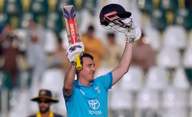 England's Harry Brook celebrates after scoring century during the tri-series one-day international cricket match between Sri Lanka and England, in Rawalpindi, Pakistan, Thursday, Oct. 22, 2026. (AP Photo/Anjum Naveed)