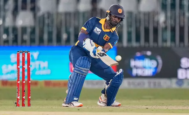 Sri Lanka's Sahan Arachchige plays a shot during the tri-series one-day international cricket match between Sri Lanka and England, in Rawalpindi, Pakistan, Thursday, Oct. 22, 2026. (AP Photo/Anjum Naveed)