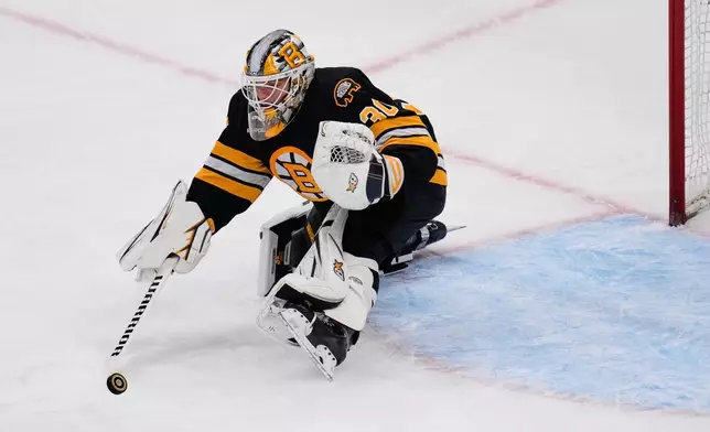 Boston Bruins goalie Michael DiPietro makes a save during the second period of an NHL hockey game against the Nashville Predators, Thursday, Oct. 22, 2026, in Boston. (AP Photo/Charles Krupa)