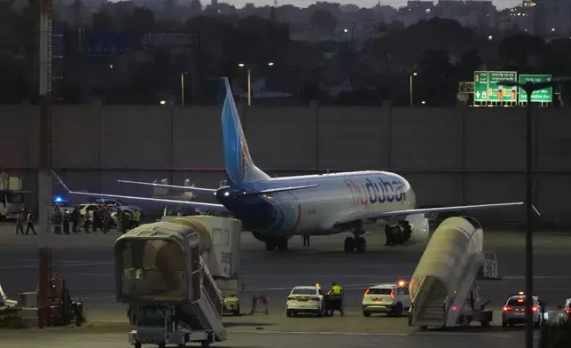 A FlyDubai aircraft carrying Israelis who experienced an emergency landing in Saudi Arabia is seen parked at Ben Gurion International Airport, near Tel Aviv, Israel, Wednesday, Sept. 30, 2026. (AP Photo/Ariel Schalit)