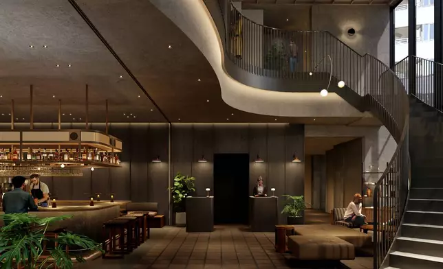 1F Lobby: An open lobby space with a spiral staircase connecting the first and second floors