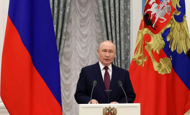Russian President Vladimir Putin delivers his speech at the presentation of a banner of the Federal Customs Service at the Kremlin in Moscow, Thursday, Oct. 22, 2026. (Gavriil Grigorov/Sputnik, Kremlin Pool Photo via AP)