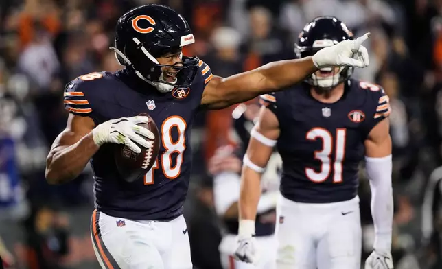 Chicago Bears linebacker D'Marco Jackson (48) celebrates after intercepting a pass in the end zone during the first half of an NFL football game against the New England Patriots in Chicago, Thursday, Oct. 22, 2026. (AP Photo/Nam Y. Huh)