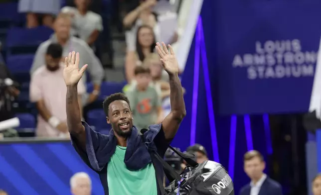 FILE - Gael Monfils, of France, acknowledges fans after losing to Learner Tien, of the United States, during the second round of the U.S. Open tennis championships, Thursday, Sept. 3, 2026, in New York. (AP Photo/Adam Hunger, File)
