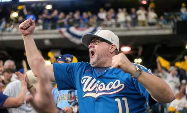 Fans attend a watch party at American Family Field to see the Milwaukee Brewers play the Tampa Bay Rays in Game 5 of baseball's World Series Wednesday, Oct. 28, 2026, in Milwaukee. (AP Photo/Ross Harried)