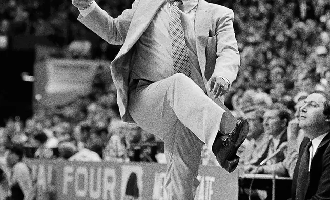 FILE - Villanova coach Rollie Massimino is up on his toes during the NCAA college basketball Final Four championship game against Georgetown, in Lexington, Ky., April 1, 1985. Underdog Villanova, shooting 79 percent from the field, beat Georgetown 66-64. No one thought we could do it, but I did," Massimino shouted afterward. (AP Photo/Bob Jordan, File)