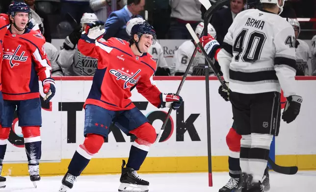 Washington Capitals right wing Ryan Leonard (9) celebrates his goal during the first period of an NHL hockey game against the Los Angeles Kings, Tuesday, Oct. 20, 2026, in Washington. (AP Photo/Nick Wass)