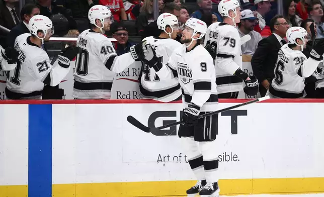 Los Angeles Kings right wing Adrian Kempe (9) celebrates his goal during the first period of an NHL hockey game against the Washington Capitals, Tuesday, Oct. 20, 2026, in Washington. (AP Photo/Nick Wass)