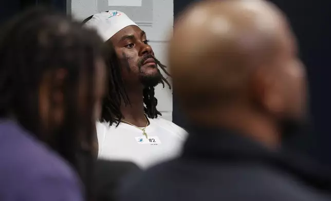 Miami Dolphins quarterback Malik Willis waits to speak to reporters following an NFL football game against the Minnesota Vikings Sunday, Oct. 4, 2026, in Minneapolis. (AP Photo/Matt Krohn)
