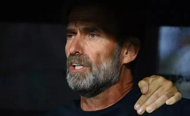 Germany's head coach Jurgen Klopp sings the national anthem before he UEFA Nations League soccer match between Greece and Germany in Thessaloniki, northern Greece, Sunday, Oct. 4, 2026. (AP Photo/Giannis Papanikos)