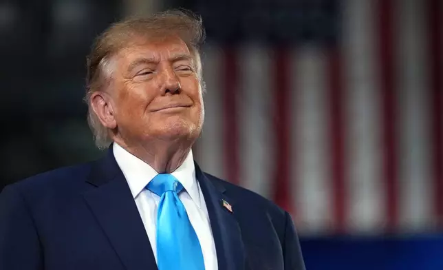 President Donald Trump arrives to speak at a campaign rally at Truist Arena at Northern Kentucky University, Saturday, Oct. 17, 2026, in Highland Heights, Ky. (AP Photo/Mark Schiefelbein)