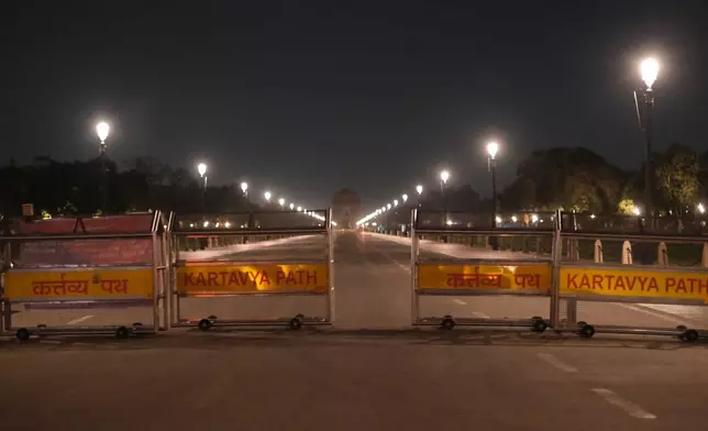 Barricades stand on Kartavya Path, the ceremonial boulevard in the heart of New Delhi, India, Monday, Oct. 12, 2026. (AP Photo/Yirmiyan Arthur)