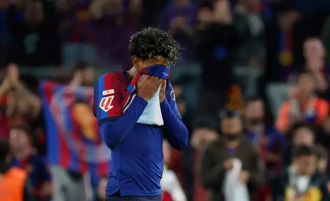 Barcelona's Lamine Yamal reacts at the end of the Spanish La Liga soccer match between FC Barcelona and Real Madrid in Barcelona, Spain, Sunday, Oct. 25, 2026. (AP Photo/Joan Monfort)