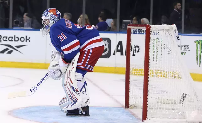 New York Rangers goaltender Igor Shesterkin stands in the goal during the first period of an NHL hockey game against the Tampa Bay Lightning, Thursday, Oct. 1, 2026, in New York. (AP Photo/Pamela Smith)