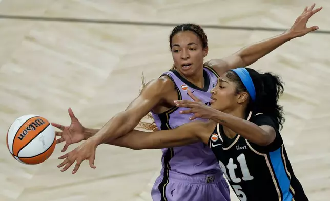 Golden State Valkyries center Kiah Stokes (41) knocks the ball away from Atlanta Dream forward Angel Reese (5) during the first half of Game 5 of the WNBA basketball finals in San Francisco, Monday, Oct. 26, 2026. (Carlos Avila Gonzalez/San Francisco Chronicle via AP)