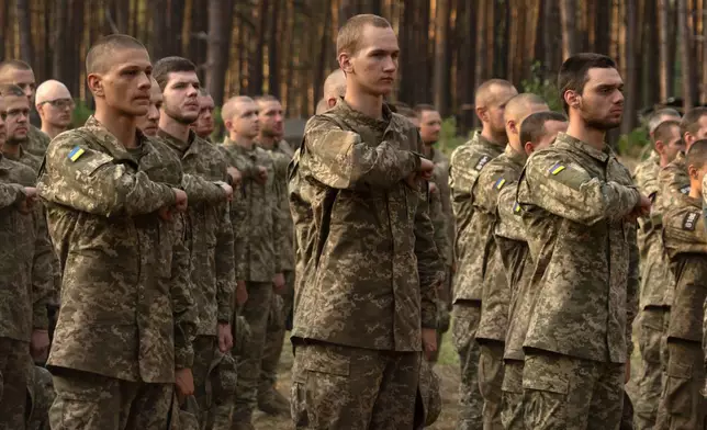 FILE - Newly recruited soldiers of Ukraine's 3rd Assault Brigade line up at a military base close to Kyiv, Ukraine, Monday, Sept. 25, 2023. (AP Photo/Efrem Lukatsky, File)