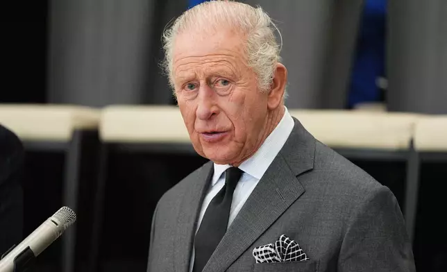 Britain's King Charles III speaks during a visit to the Aberfan and Merthyr Vale Community Centre in Aberfan, Wales, Wednesday, Oct. 21, 2026. (Aaron Chown/PA via AP, Pool)