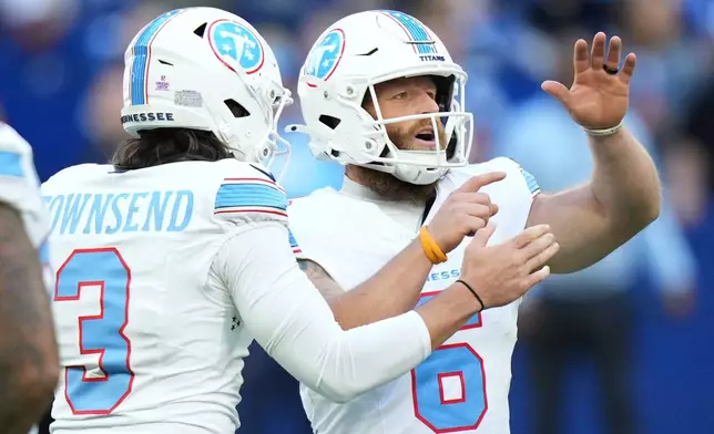 Tennessee Titans place-kicker Joey Slye (6) celebrates his field goal with punter Tommy Townsend (3) during the second half of an NFL football game against the Indianapolis Colts, Sunday, Oct. 18, 2026, in Indianapolis. (AP Photo/AJ Mast)