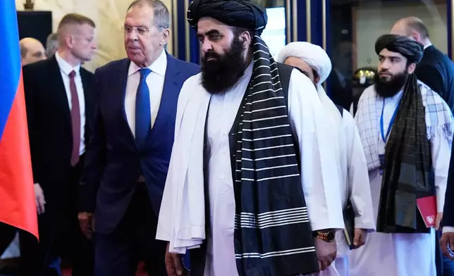 From left, Russian Foreign Minister Sergey Lavrov and Afghanistan's Foreign Minister Amir Khan Muttaqi attend the Moscow format consultations on Afghanistan in Moscow, Monday, Oct. 5, 2026. (AP Photo/Alexander Zemlianichenko)