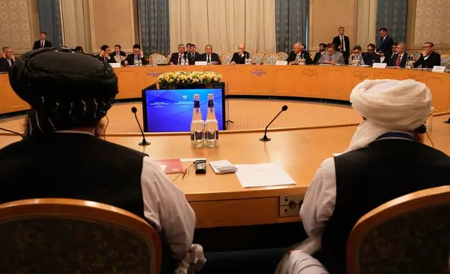 Russian Foreign Minister Sergey Lavrov, center, speaks during the Moscow format consultations on Afghanistan in Moscow, Monday, Oct. 5, 2026. (AP Photo/Alexander Zemlianichenko)