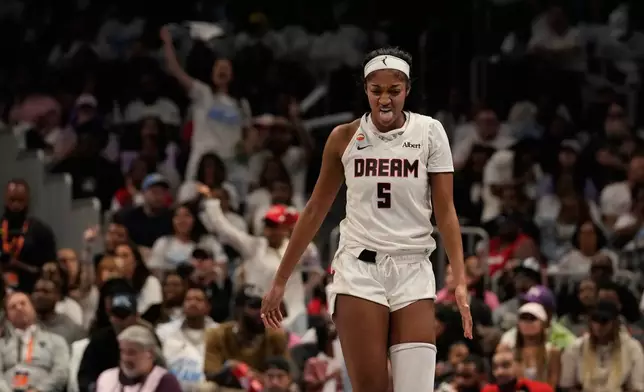 Atlanta Dream forward Angel Reese (5) reacts to an injury in the second half during Game 4 of the WNBA basketball finals against the Golden State Valkyries on Saturday, Oct. 24, 2026, in Atlanta. (AP Photo/Brynn Anderson)