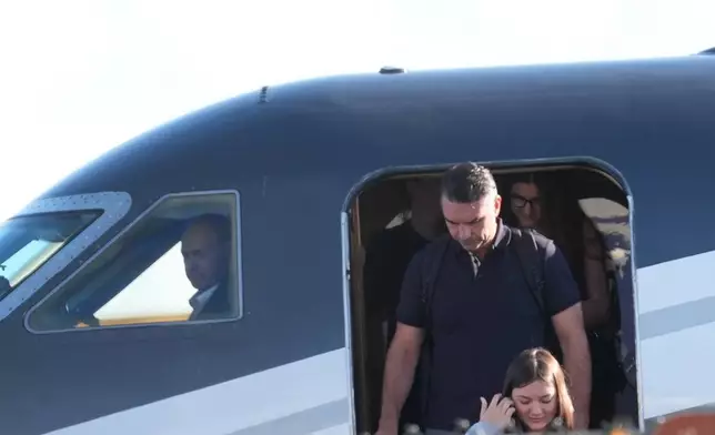 Flávio Bolsonaro arrives at Miami-Opa Locka Executive Airport on Wednesday, Oct. 28, 2026, in Opa-locka, Fla. (AP Photo/Marta Lavandier)