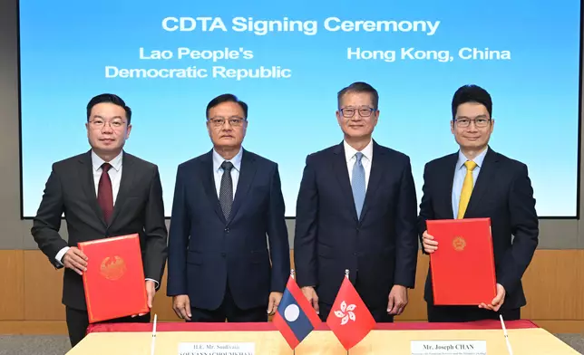 Hong Kong and Laos signed a comprehensive avoidance of double taxation agreement today (October 29). Photo shows (from left) Deputy Minister of Finance of Laos Mr Soulivath Souvannachoumkham; the Deputy Prime Minister and Minister of Finance of Laos, Mr Santiphab Phomvihane; the Financial Secretary, Mr Paul Chan; and the Acting Secretary for Financial Services and the Treasury, Mr Joseph Chan, at the signing ceremony. Source: HKSAR Government Press Releases