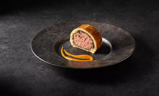 The Mira Hong Kong's Impossible Meat Wellington with Tomato Puree: Plant-based “Future Meat” replaces traditional meat, wrapped with rich mushroom duxelles and baked in golden puff pastry. Paired with a tangy, refreshing tomato purée to balance the richness, this vegetarian Wellington delivers the classic dish’s signature layers and satisfying flavours.