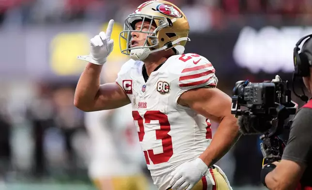 San Francisco 49ers running back Christian McCaffrey (23) celebrates after rushing for a touchdown during the first half of an NFL football game against the Atlanta Falcons in Atlanta, Sunday, Oct. 25, 2026. (AP Photo/Brynn Anderson)